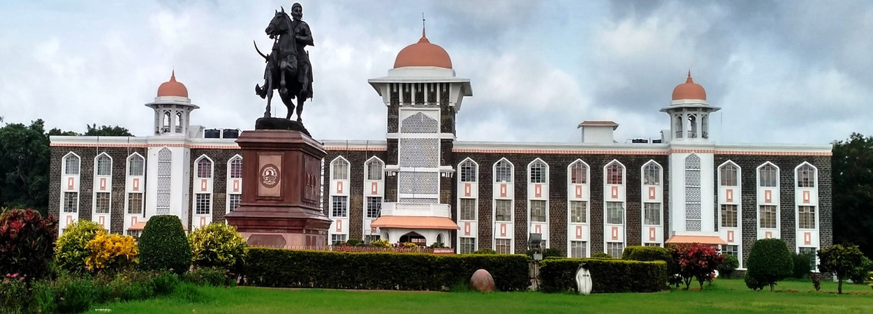 Ph.D. From Shivaji University, Maharashtra